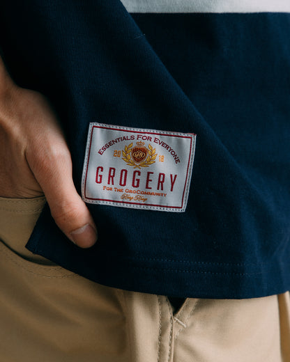GROCERY COLLEGE LOGO STRIPE POLO SHIRT/ CREAM & NAVY