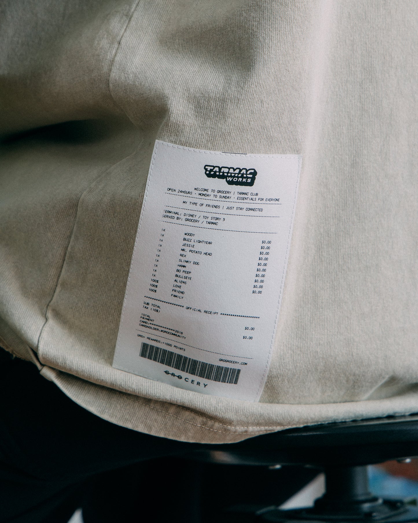 ⁠GROCERY | TARMAC | TOY STORY THE TOYS WASHED GRAPHIC BOXY TEE/ GREY OLIVE
