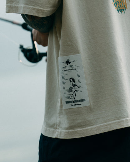 GROCERY x CLUB STUBBORN WASHED LION FISH GRAPHIC BOXY TEE/ CREAM