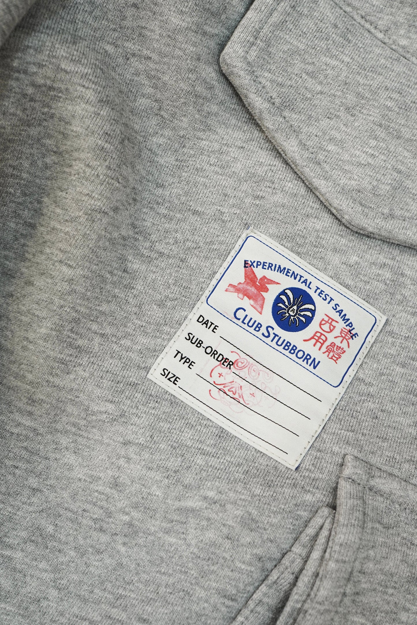 CLUB STUBBORN X OLDSOILISM M47 CROPPED SWEAT PANTS/ LASER CRANE GREY