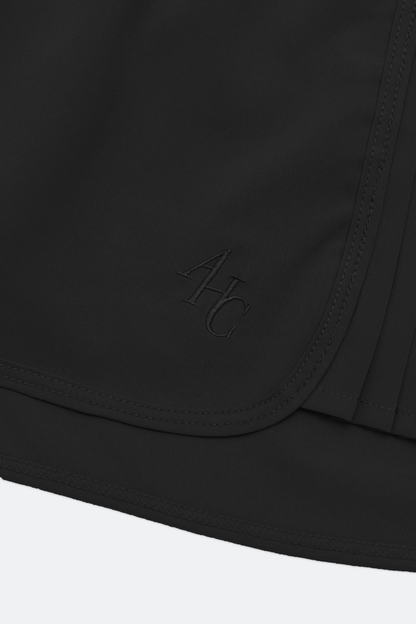 Aim Higher Club Active to Street Pleat Skort/ Black - GROGROCERY