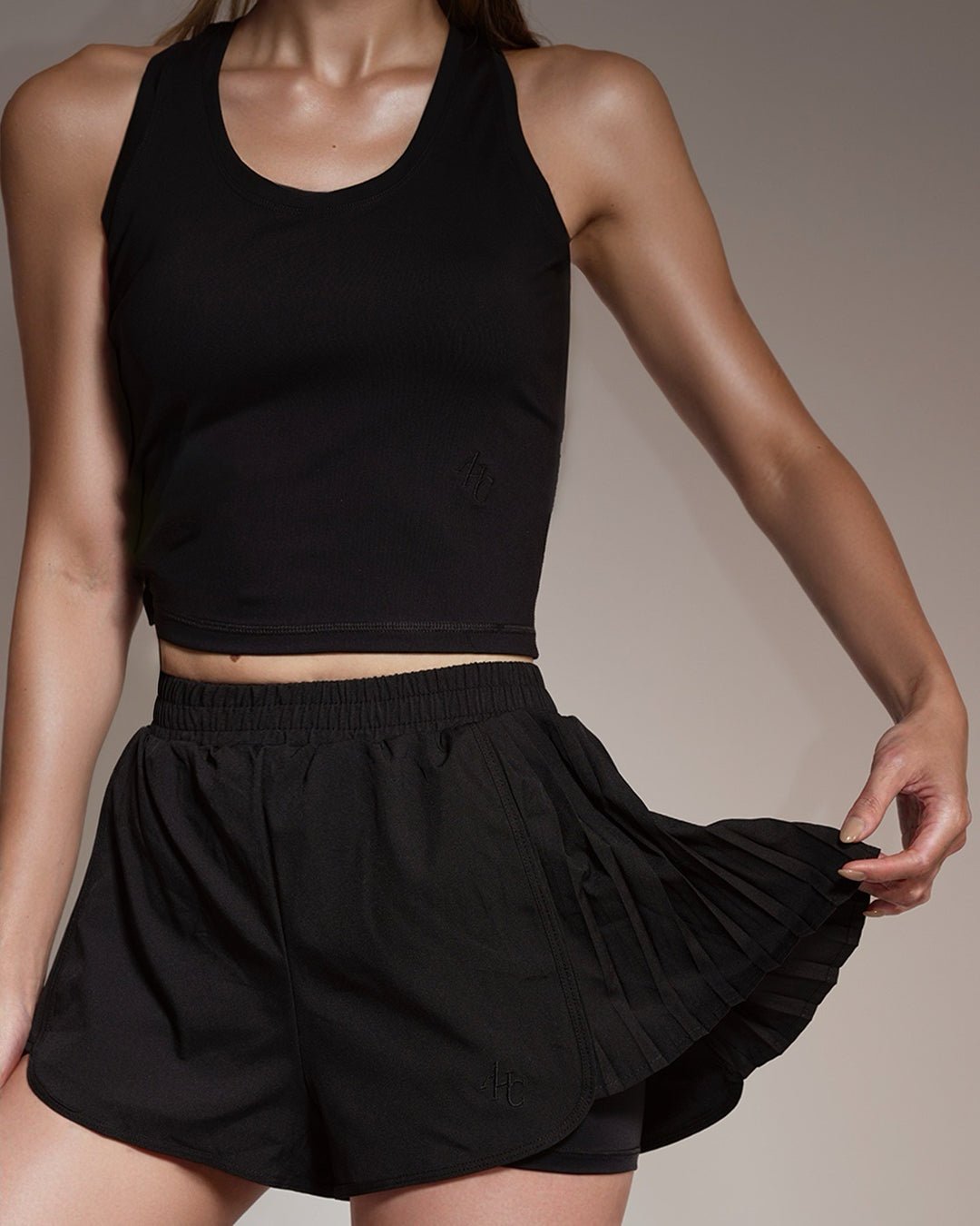 Aim Higher Club Active to Street Pleat Skort/ Black - GROGROCERY