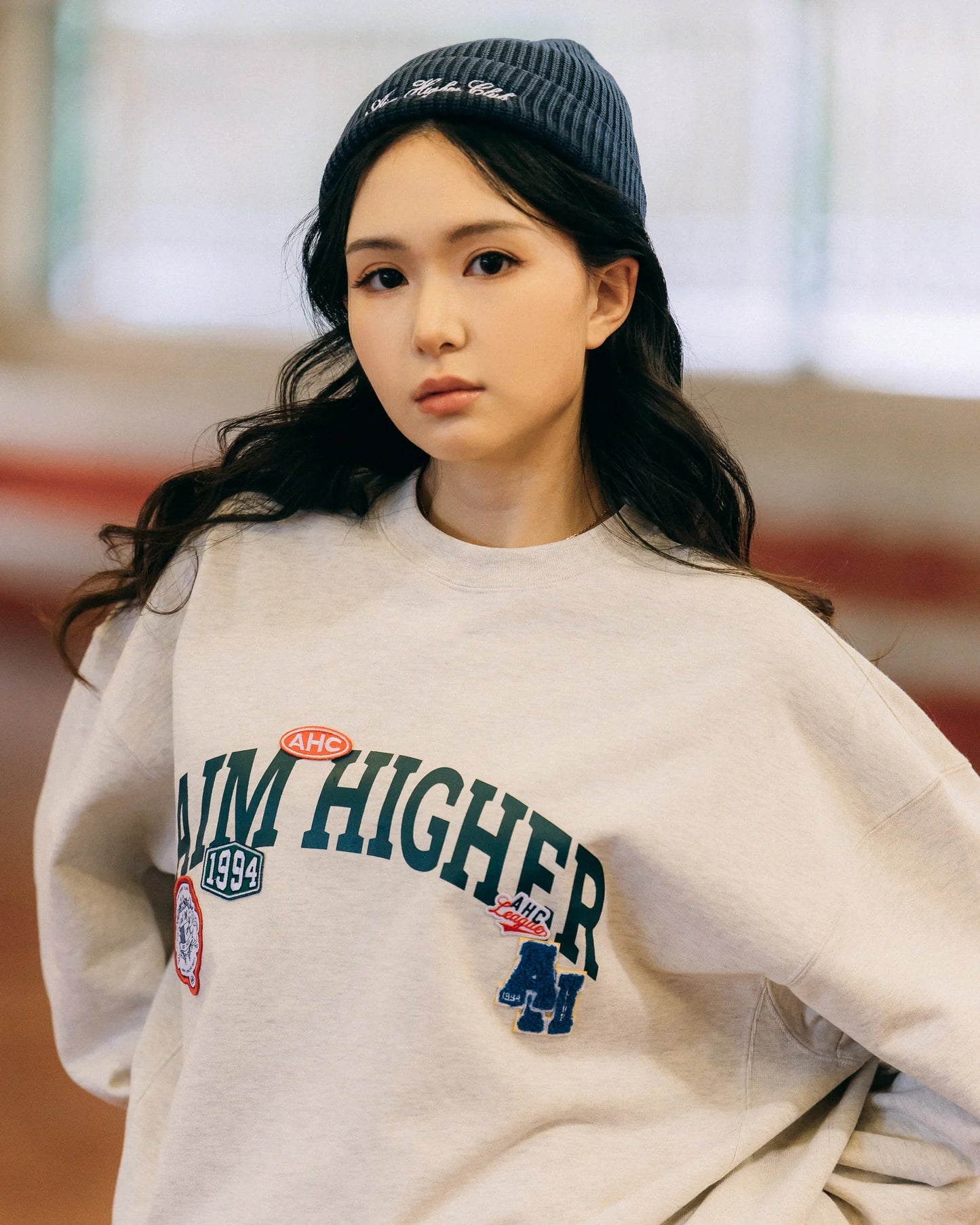Aim Higher Club Unisex College Badge Crewneck Sweatshirt/ Oat - GROGROCERY