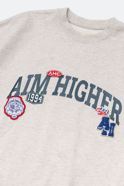 Aim Higher Club Unisex College Badge Crewneck Sweatshirt/ Oat - GROGROCERY