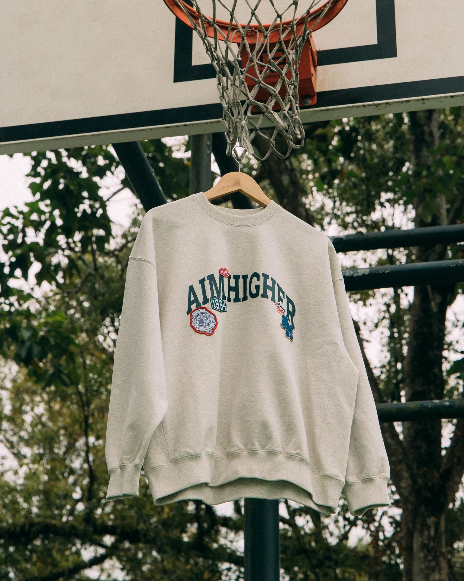 Aim Higher Club Unisex College Badge Crewneck Sweatshirt/ Oat - GROGROCERY