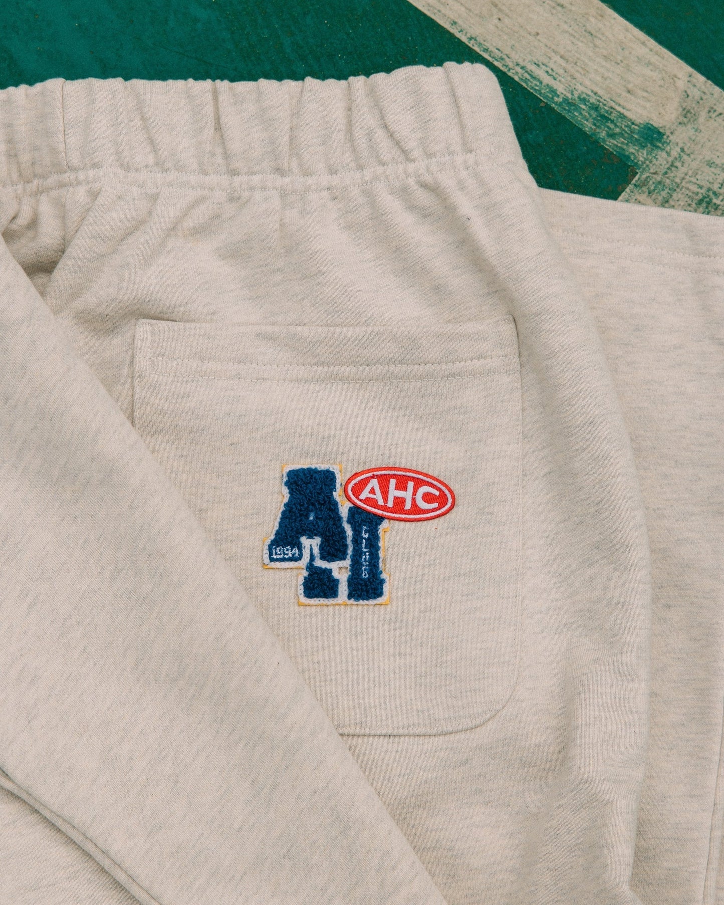 Aim Higher Club Unisex College Badge Sweatpants / Oat - GROGROCERY