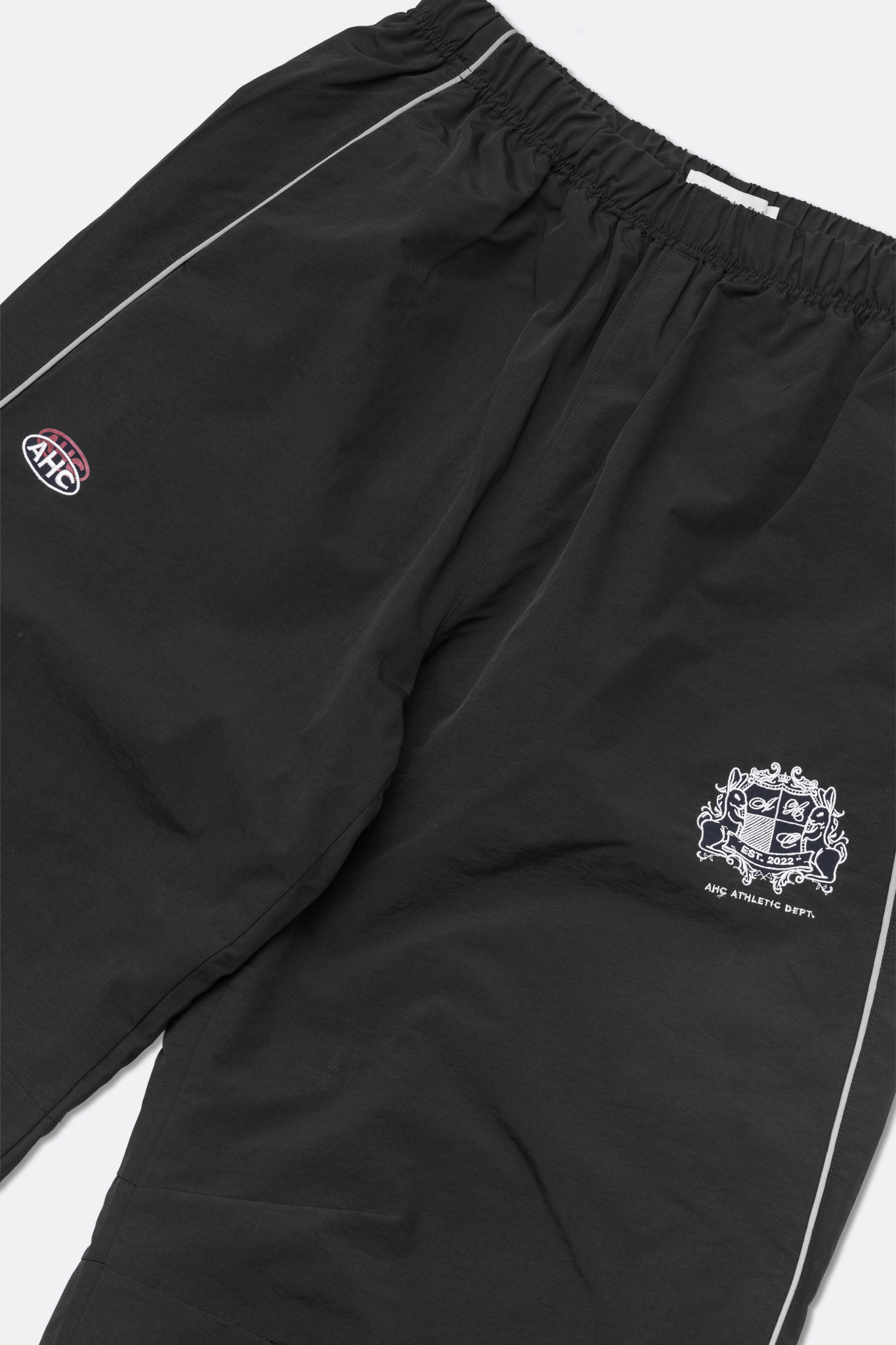 Aim Higher Club Unisex College Emblem Reflective Track Pants/ Black - GROGROCERY