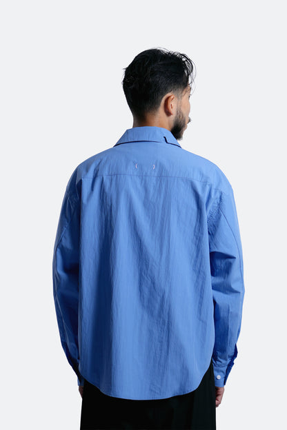 (empty) manual co. curved placket long sleeve shirt/ elemental blue
