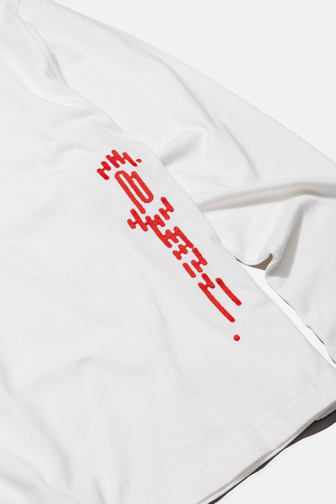 (empty) manual co. red embroidery L/S tee/ white - GROGROCERY