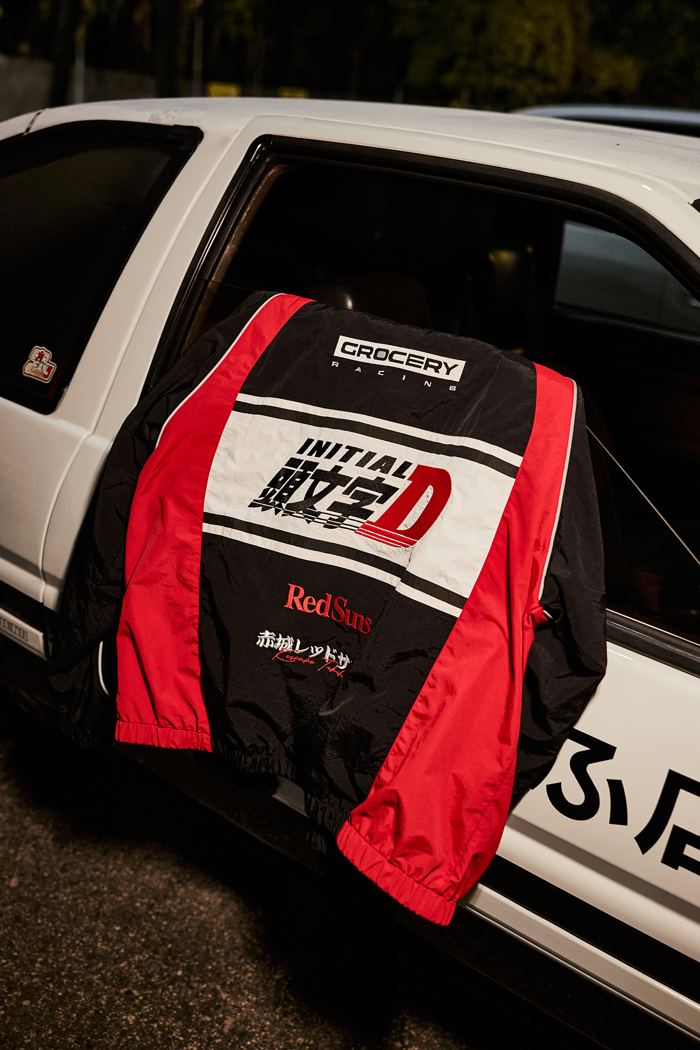 GROCERY | TARMAC | INITIAL D REDSUNS REFLECTIVE RACING TRACK JACKET/ RED & BLACK - GROGROCERY