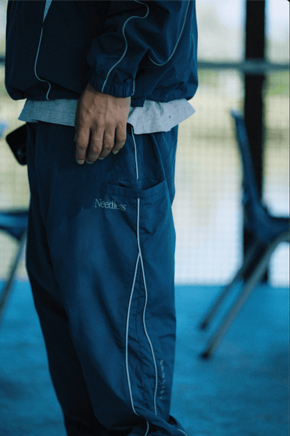 GROCERY X NEEDLESS REFLECTIVE TRACK PANTS/ TEAL BLUE - GROGROCERY