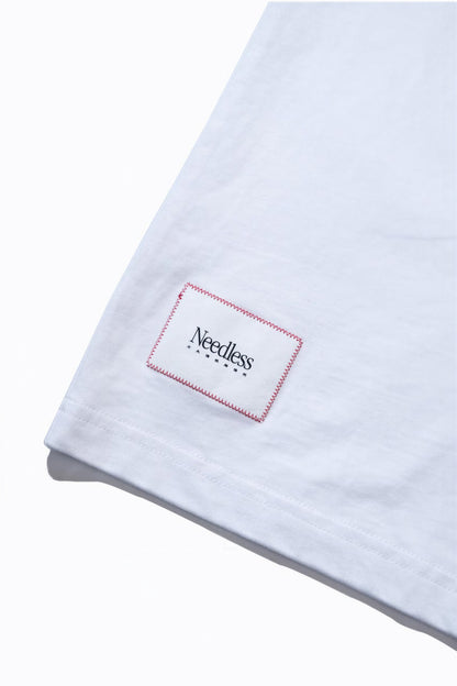 NEEDLESS SS26 SIGNATURE LOGO POCKET TEE/ WHITE