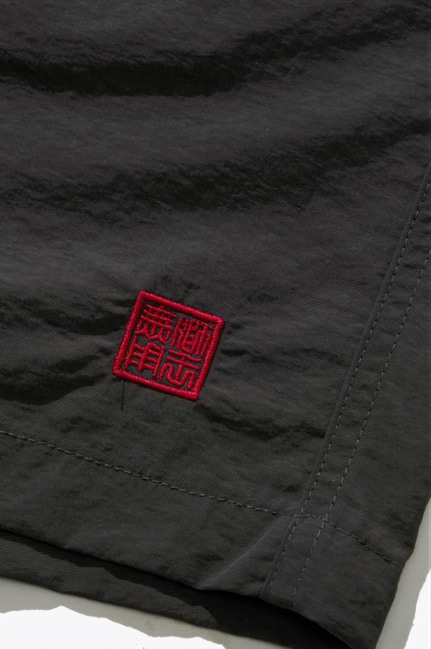 NEEDLESS SS26 NYLON SHORTS/ BLACK